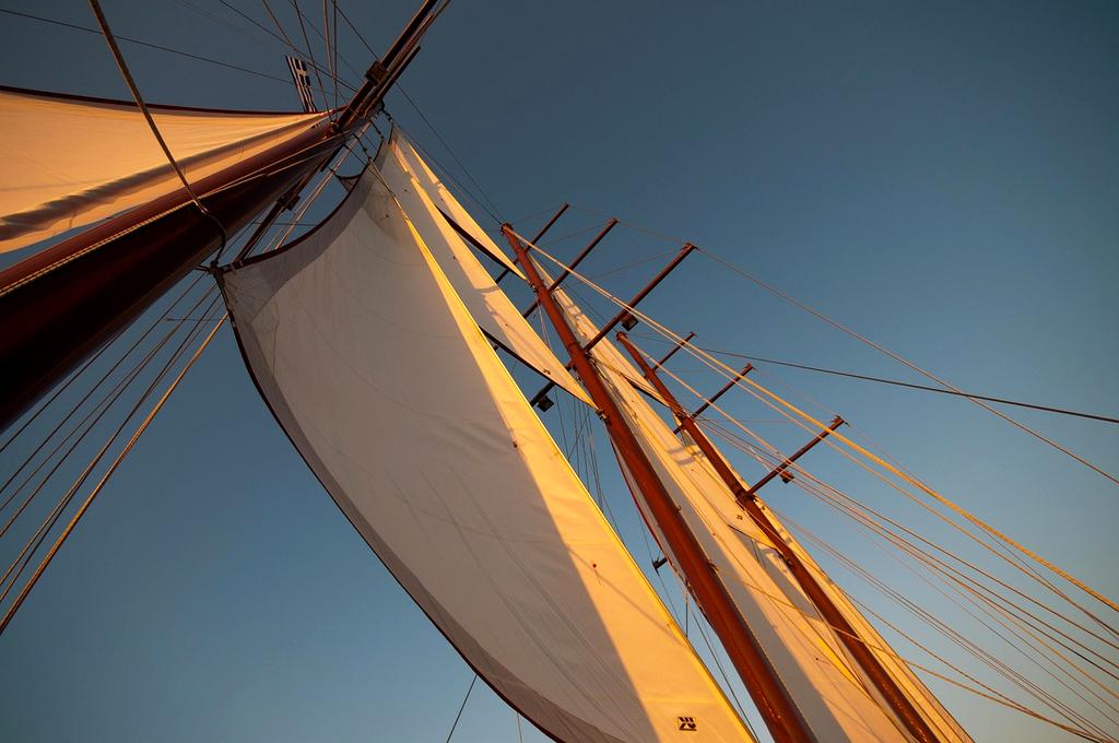 Spectacular sunset view over Santorini white buildings and blue sea